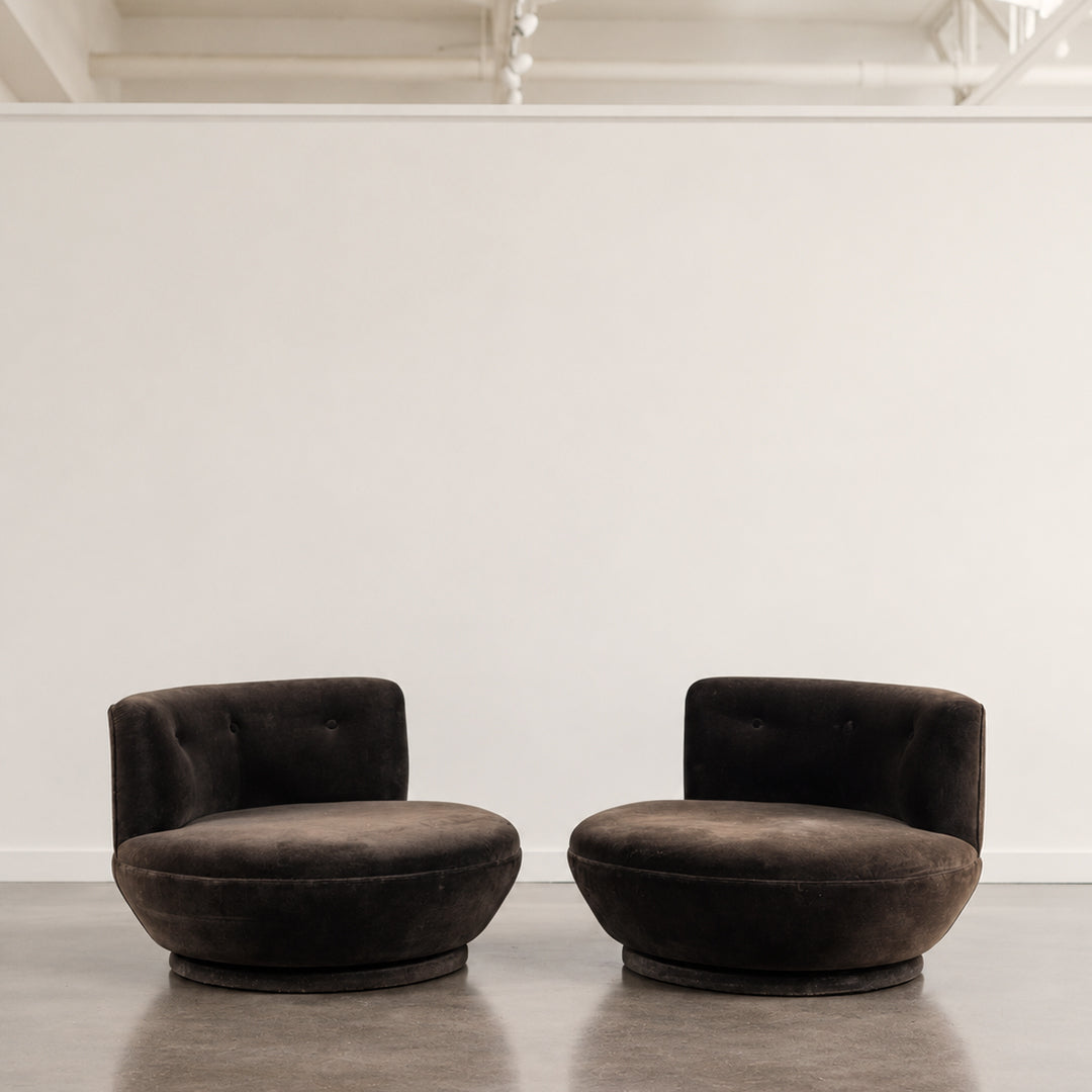 A Pair Saucer Swivel Lounge Chairs in the style of Milo Baughman (available 11/01)