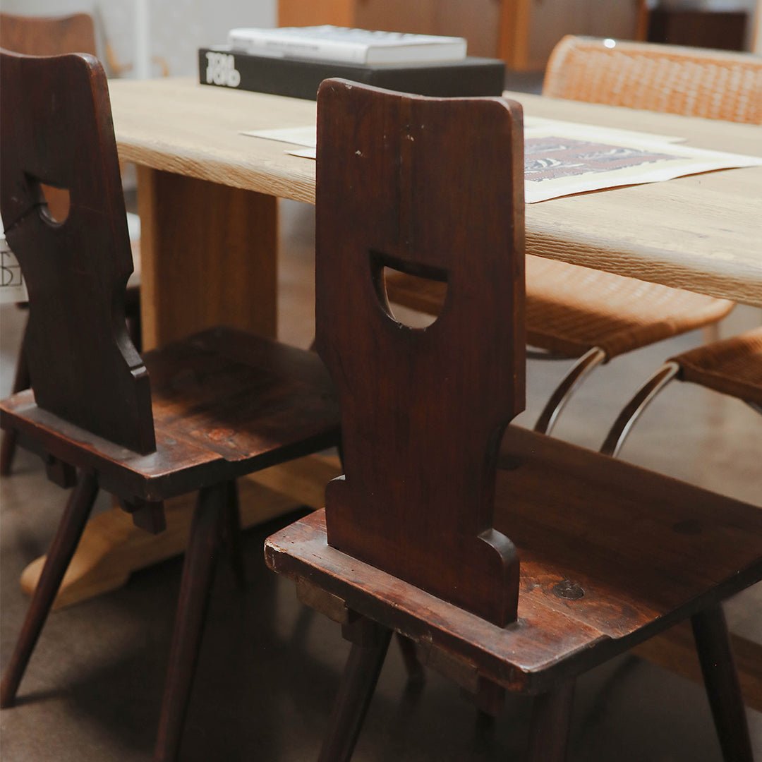 A Set of Four Brutalist Dining Chairs in the style of Torck