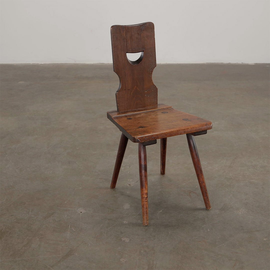 A Set of Four Brutalist Dining Chairs in the style of Torck