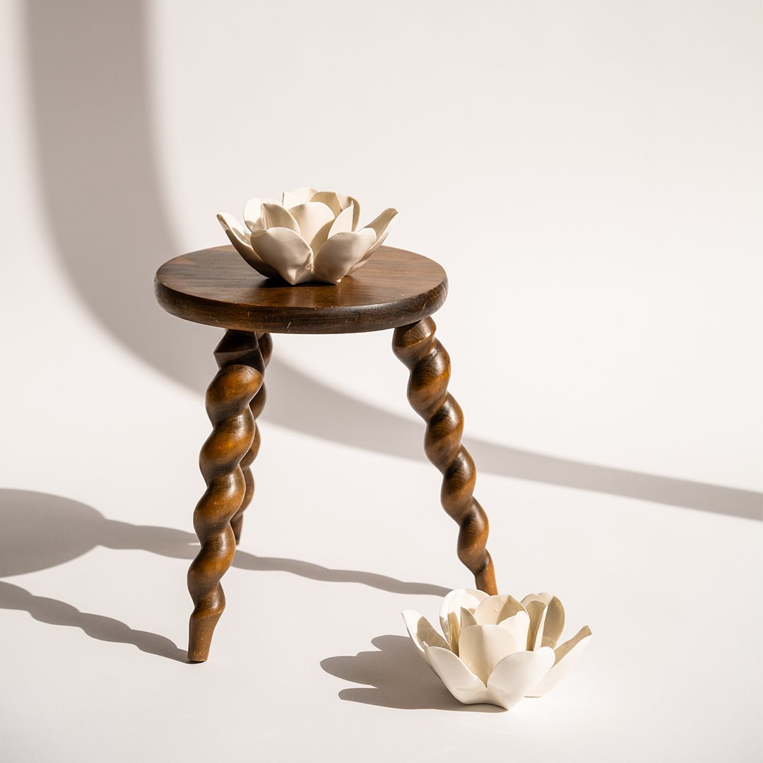 A Pair of Porcelain Lotus Candle Holders
