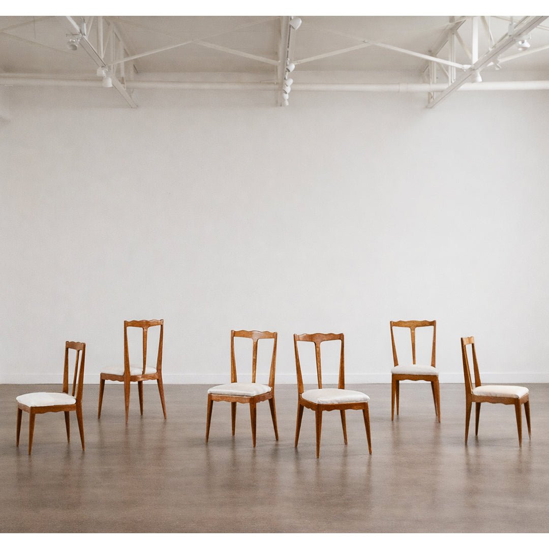 A Set of Six Italian Sculptural Dining Chairs