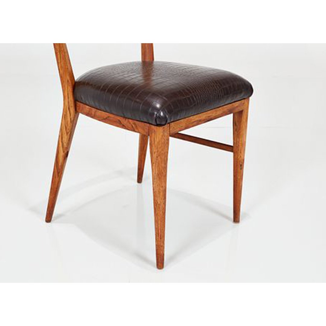 A Set of 6 Dining Chairs by Paul McCobb