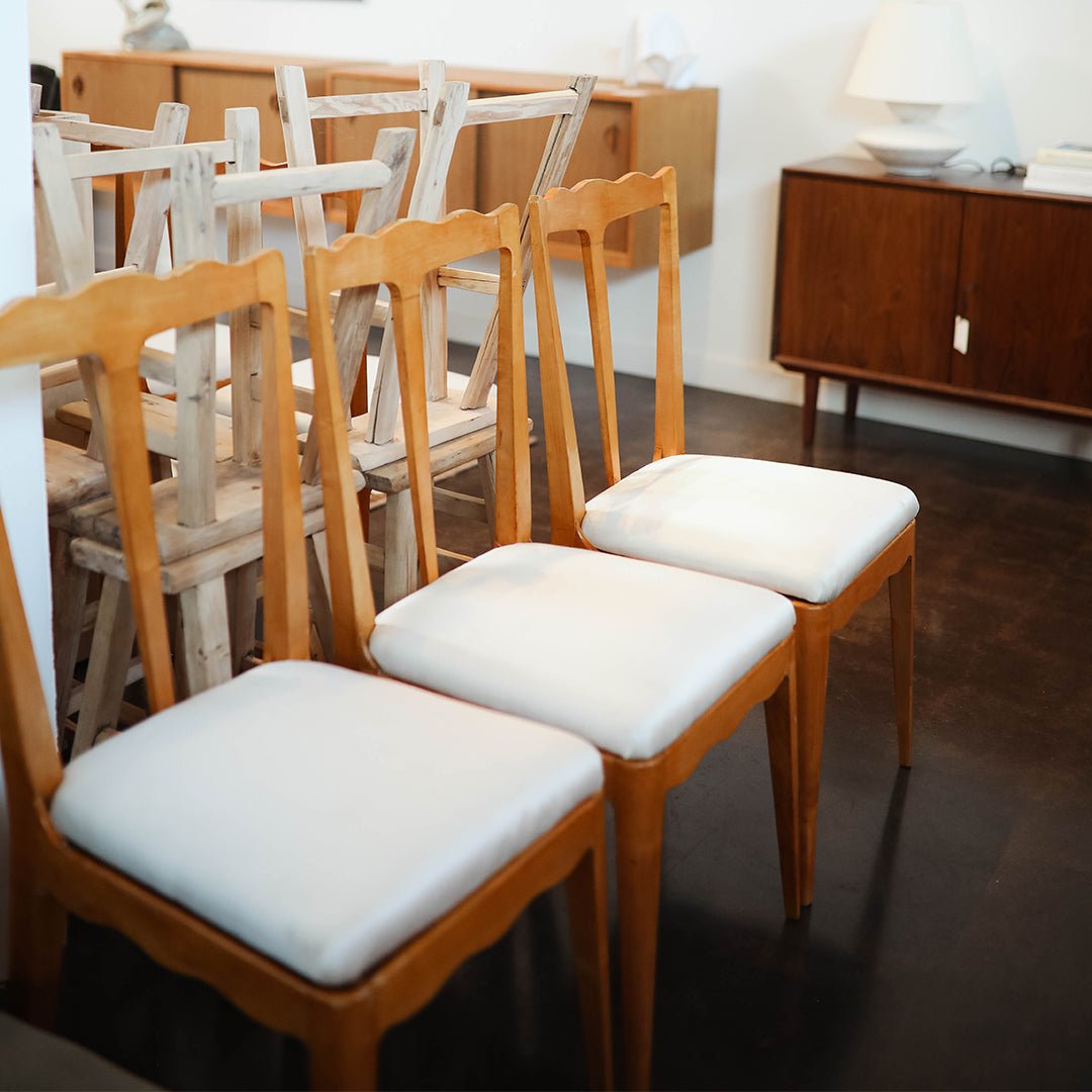 A Set of Six Italian Sculptural Dining Chairs