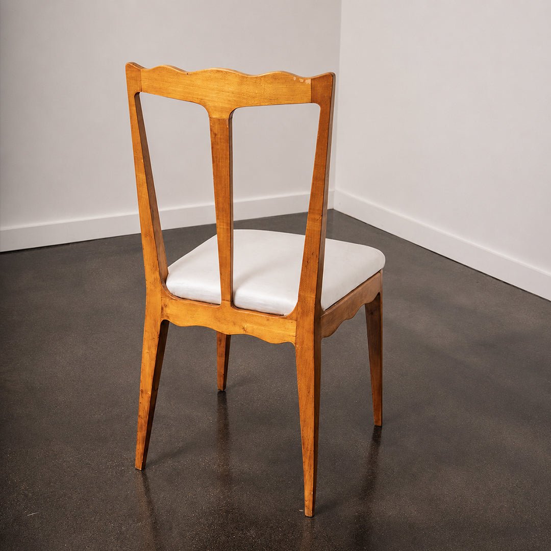 A Set of Six Italian Sculptural Dining Chairs
