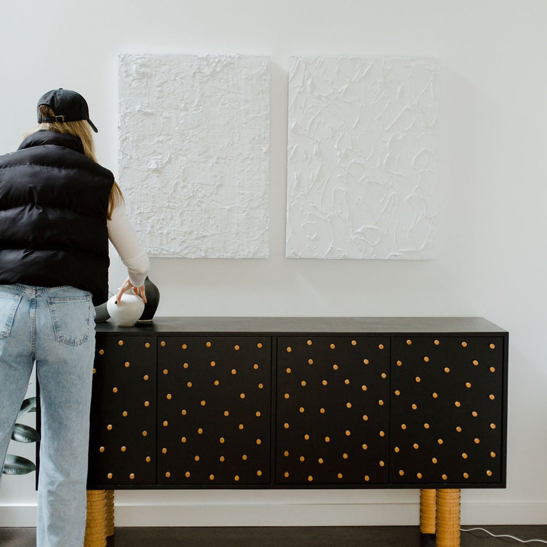 Jason Adkins artwork styled with unique vintage pieces at The Selby House.