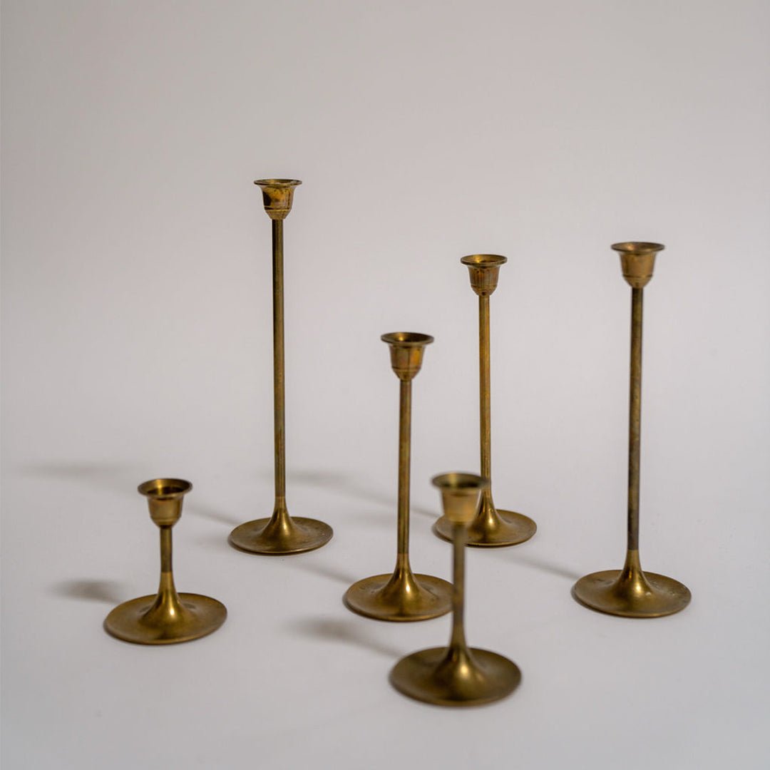 A Set of Six Tapered Vintage Brass Tulip Candlesticks