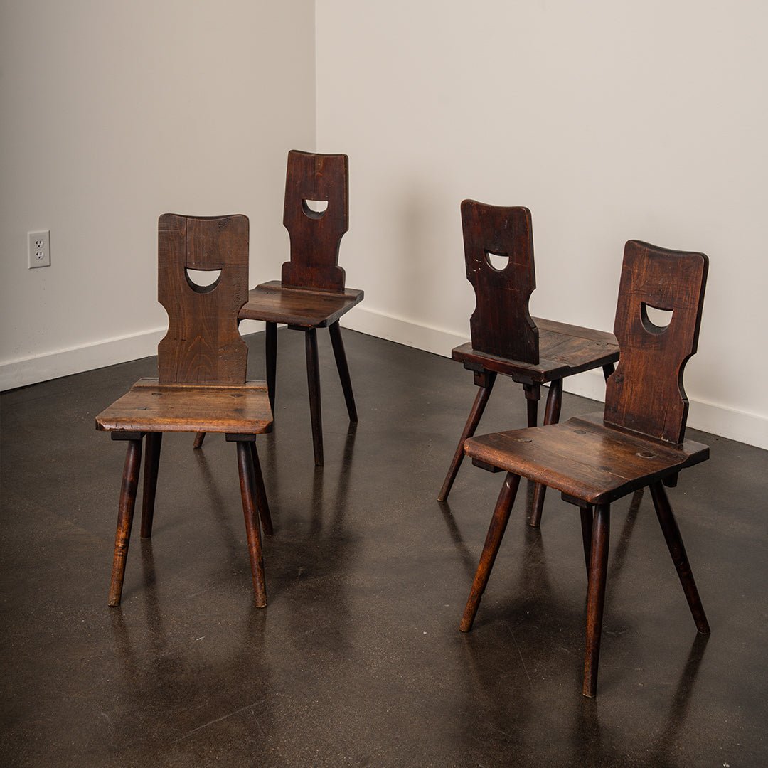A Set of Four Brutalist Dining Chairs in the style of Torck