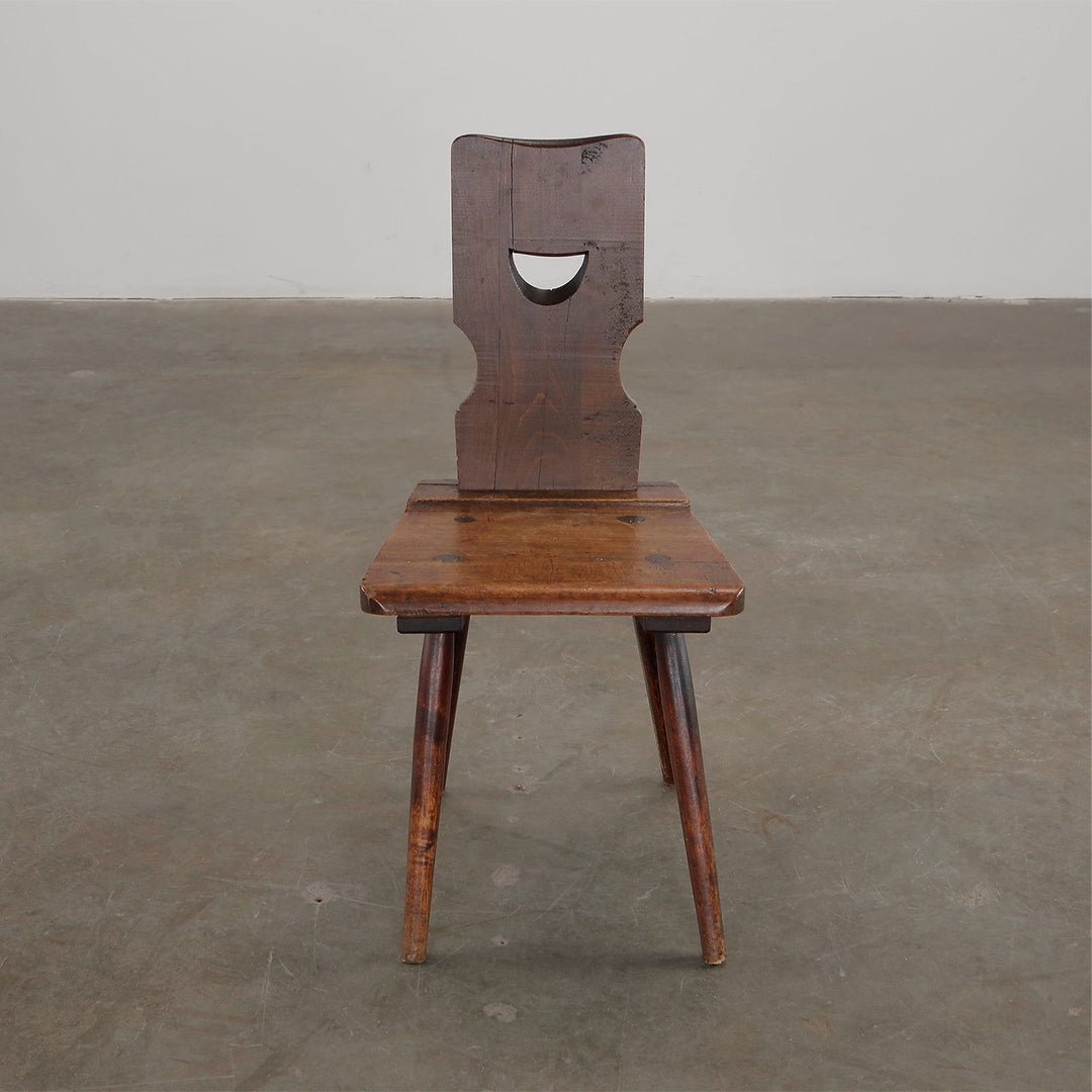 A Set of Four Brutalist Dining Chairs in the style of Torck
