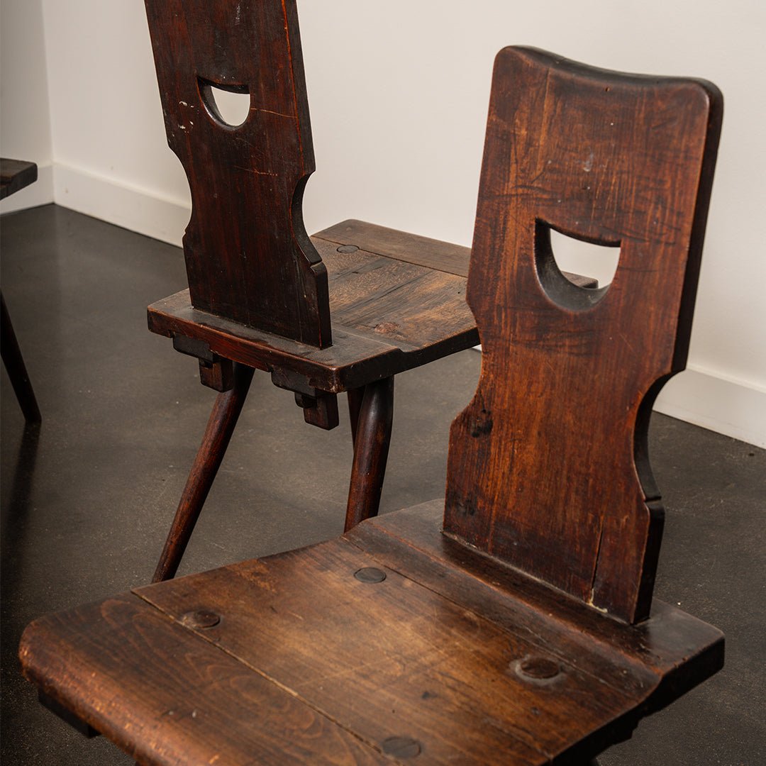 A Set of Four Brutalist Dining Chairs in the style of Torck