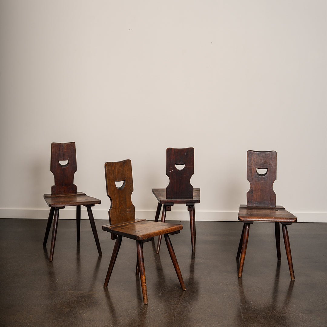 A Set of Four Brutalist Dining Chairs in the style of Torck