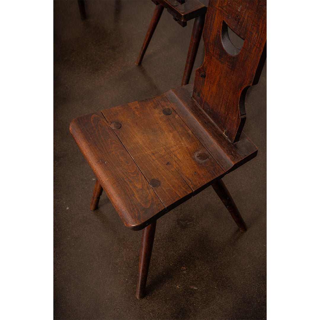 A Set of Four Brutalist Dining Chairs in the style of Torck