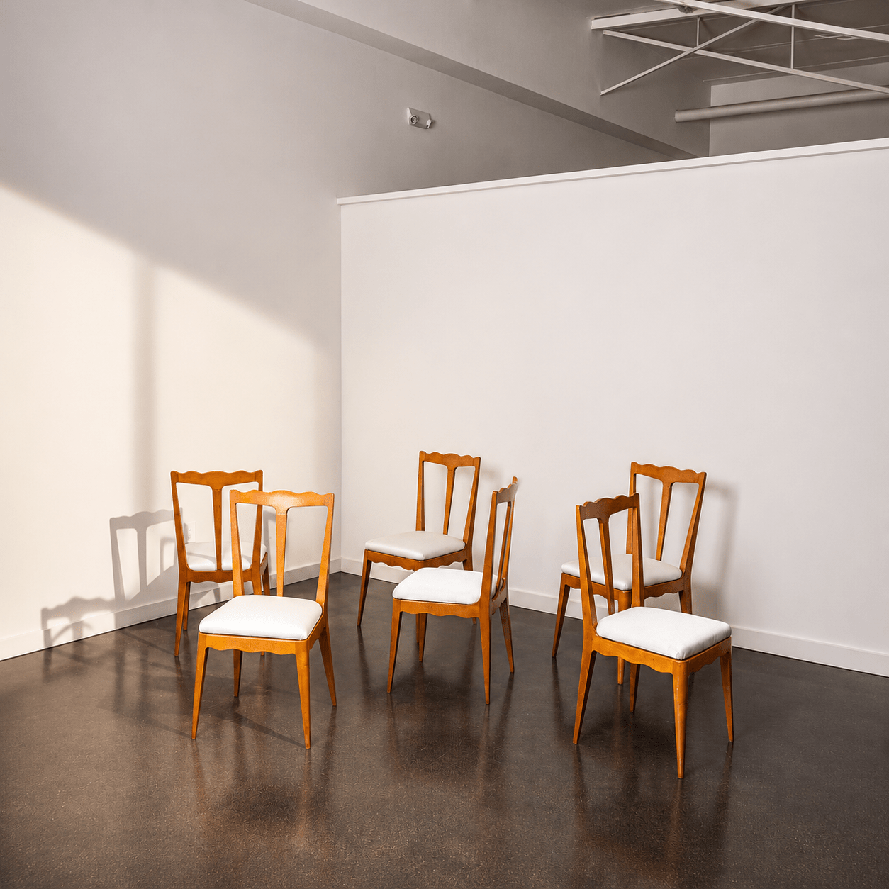 A Set of Six Italian Sculptural Dining Chairs