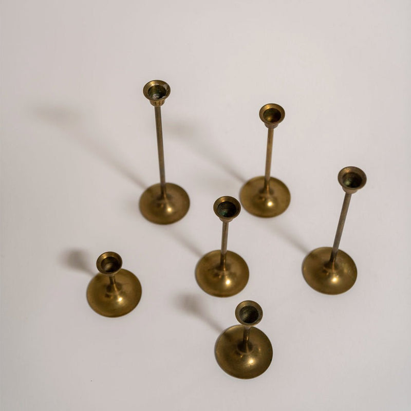 A Set of Six Tapered Vintage Brass Tulip Candlesticks